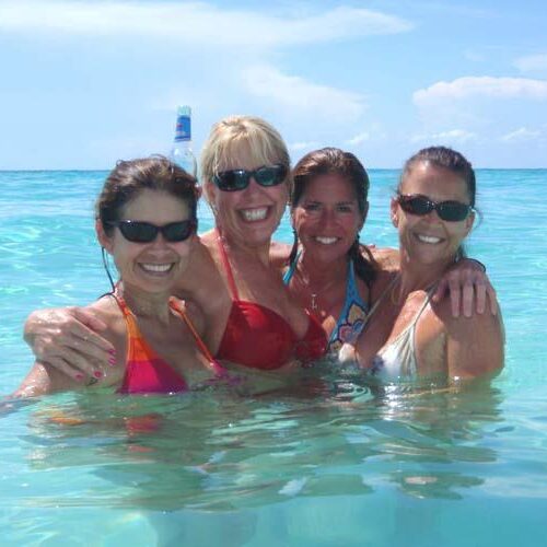 four women in a beach